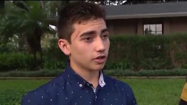 Teen rushes into burning home to save dogs
