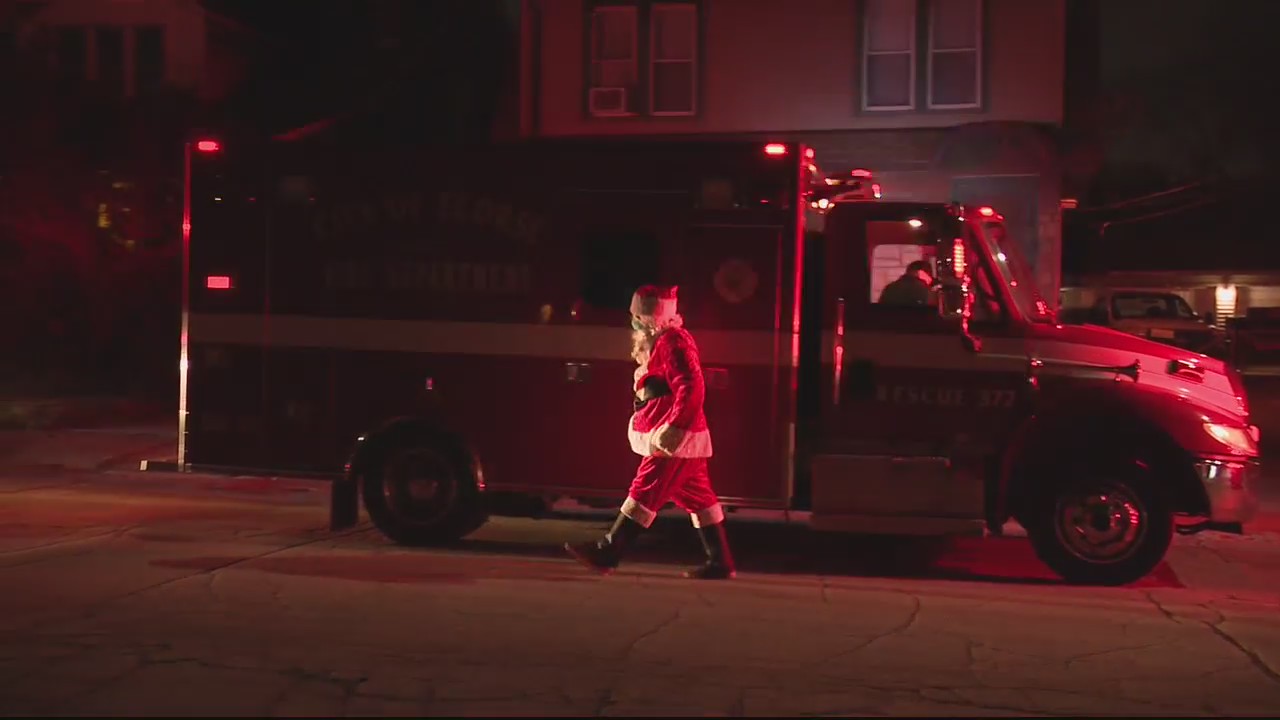 Ecorse firefighters hit streets to spread holiday cheer