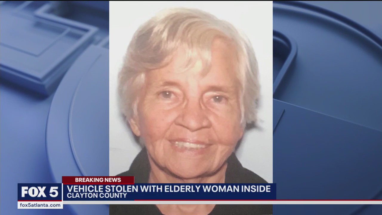 Vehicle stolen with elderly woman inside