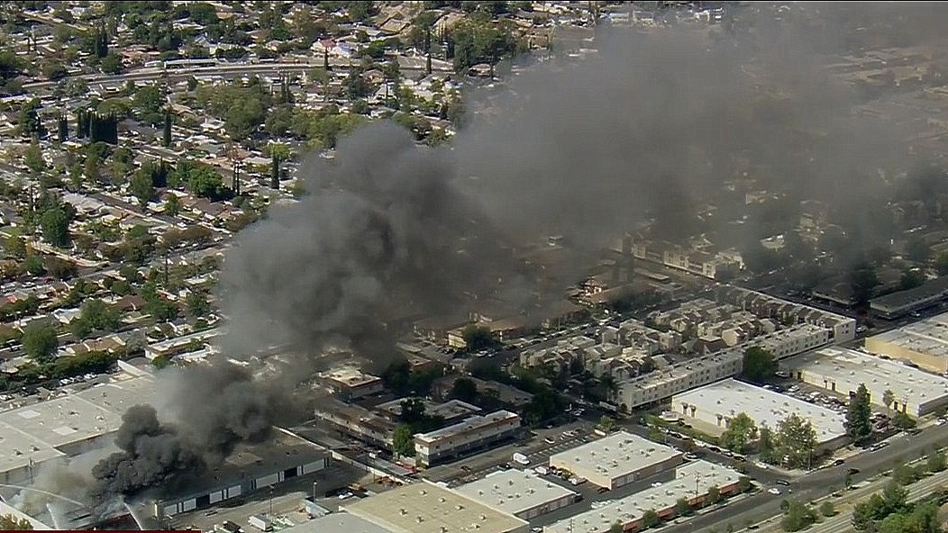 Firefighters battling greater alarm structure fire in Canoga Park