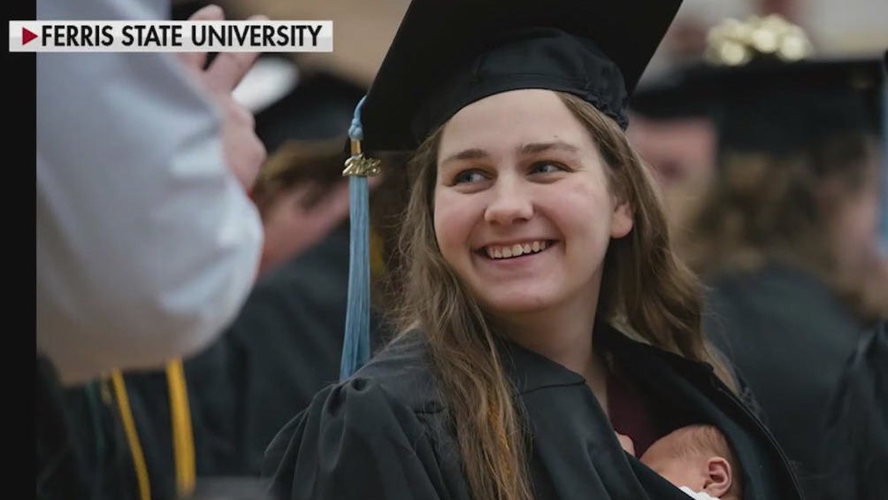New mom brings baby to graduation