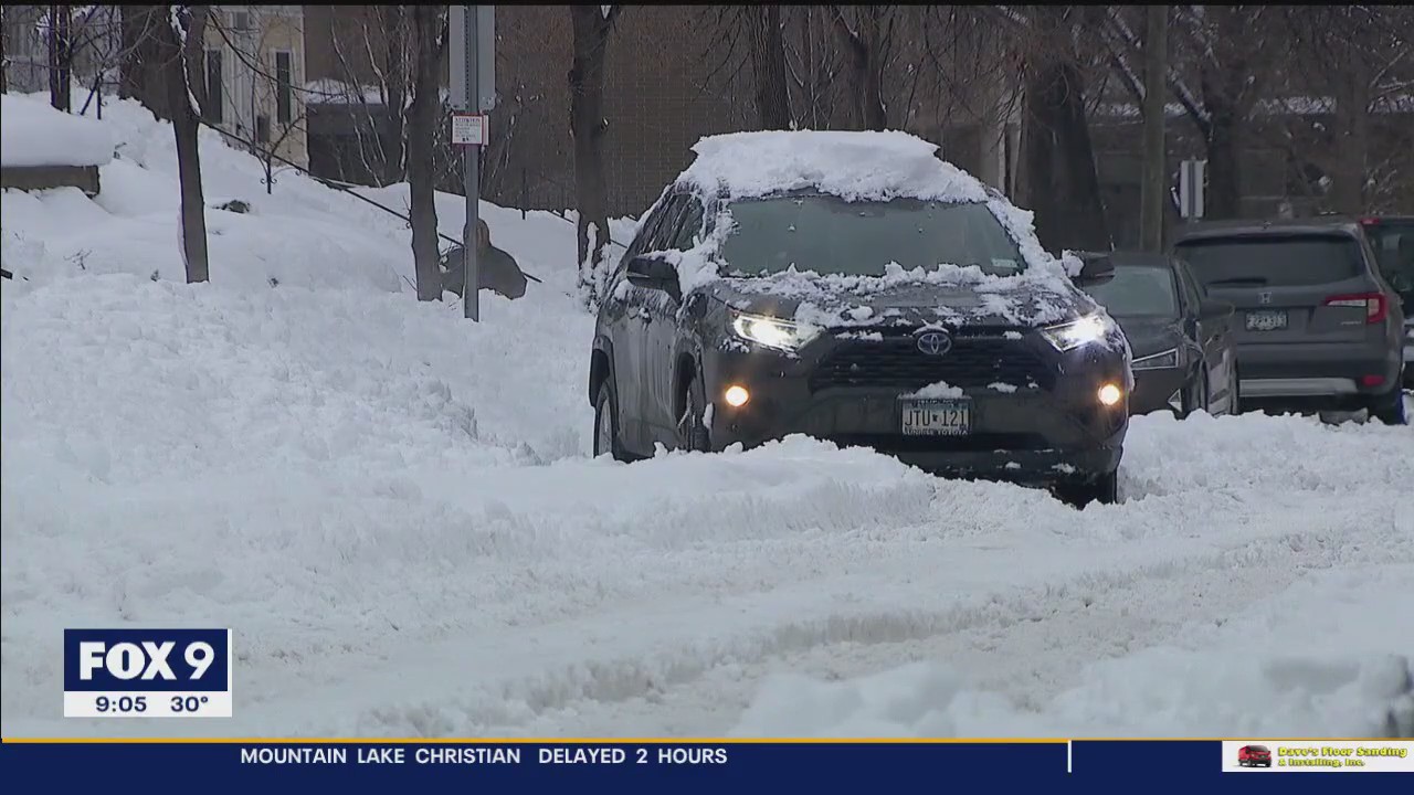 Twin Cities residents dig out for delayed snow emergency