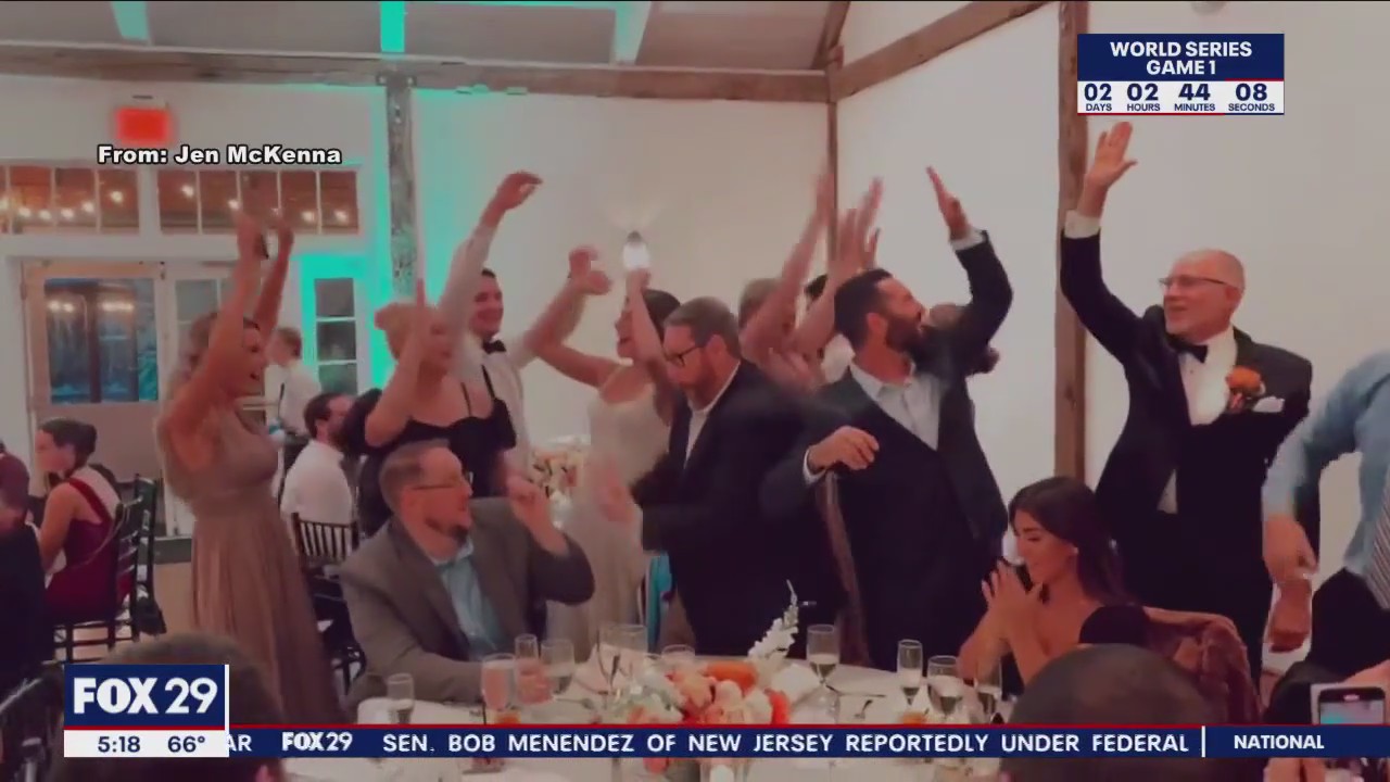 Phillies fans react to National League pennant during wedding reception