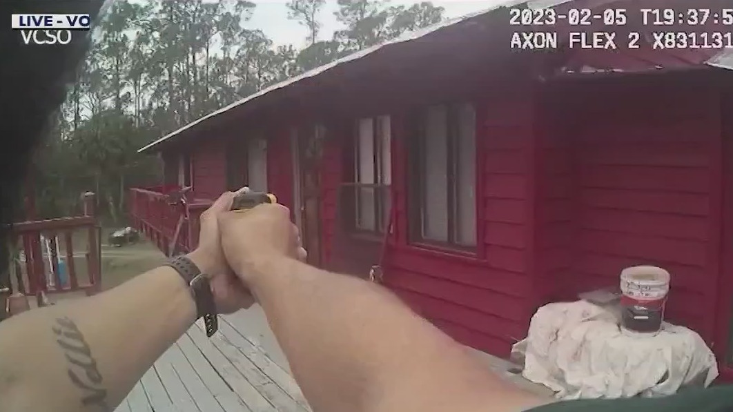 Deputies said man armed with knives charged at them