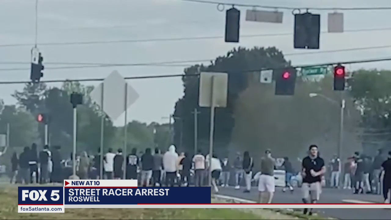 About a dozen arrested for taking over Roswell intersection