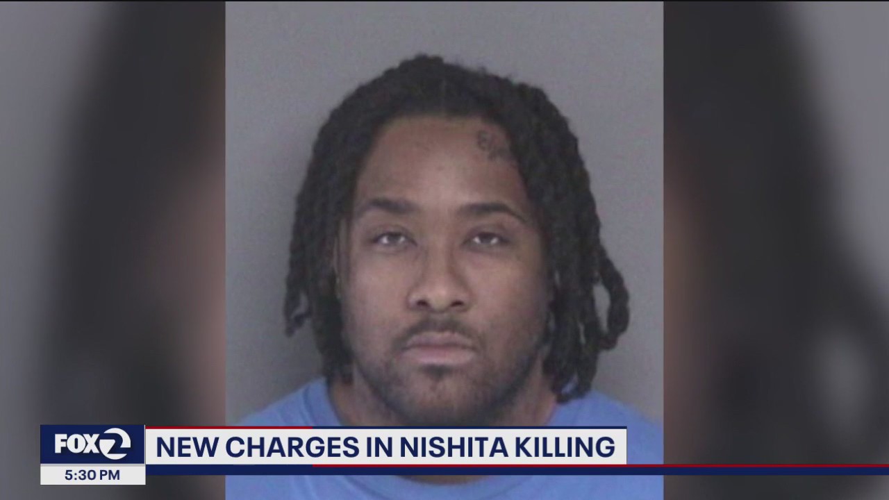 Suspects in security guard's killing face new charges