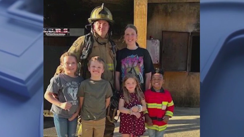 Firefighter needing help after narrow escape