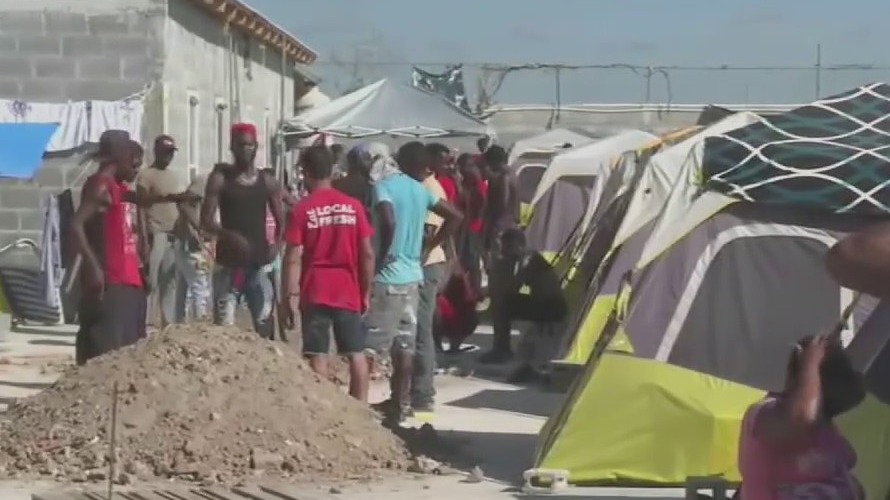 Thousands of migrants waiting in overcrowded shelters in Mexico