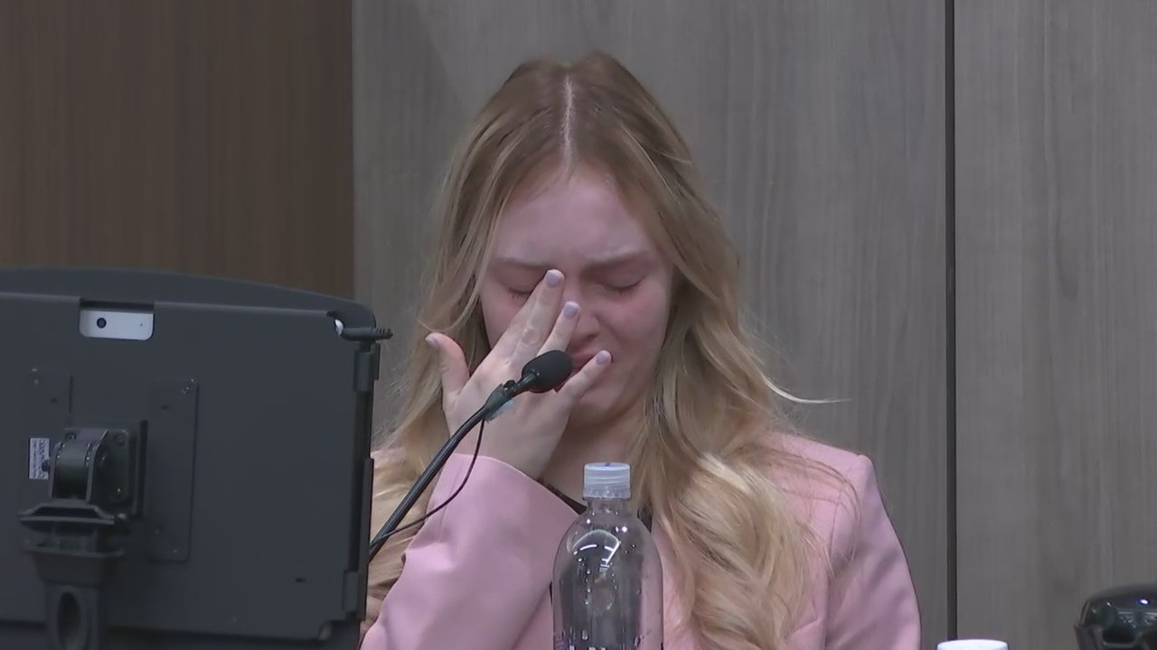 Maya Kowalski breaks down on stand