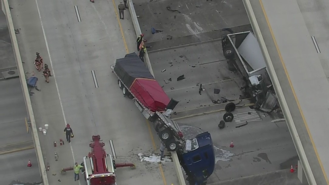 Grand Parkway crash: 18-wheeler dangling from overpass, another overturned