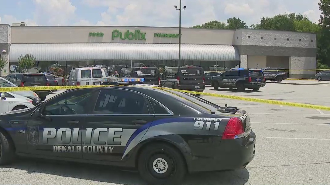 Search continues for gunman accused of shooting a man to death in a DeKalb County Publix parking lot