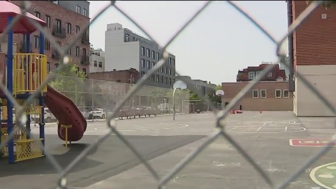 NYC housing migrants in public school gyms