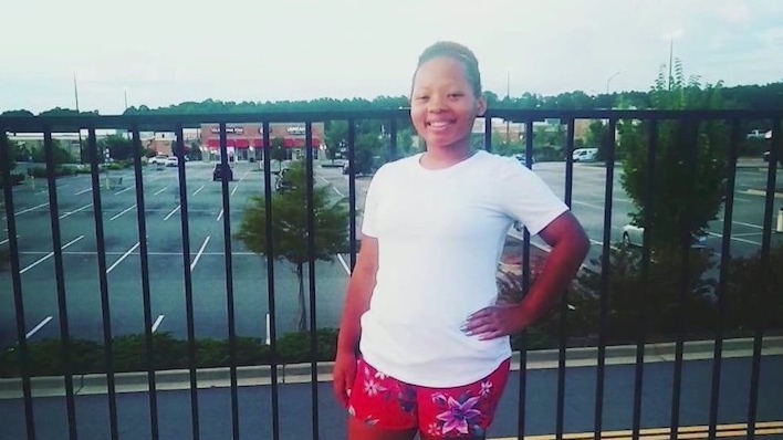 High school football player injured on campus back at home