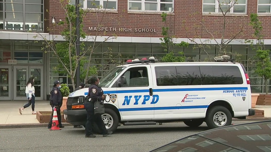 Queens students return to class day after shooting