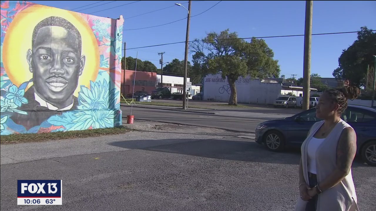 Residents pay respects at mural honoring Ahmaud Arbery