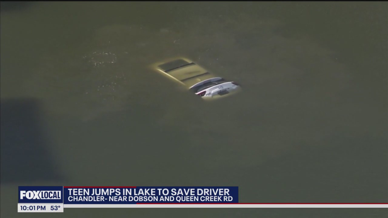 Teen jumps into cold lake to try and rescue driver