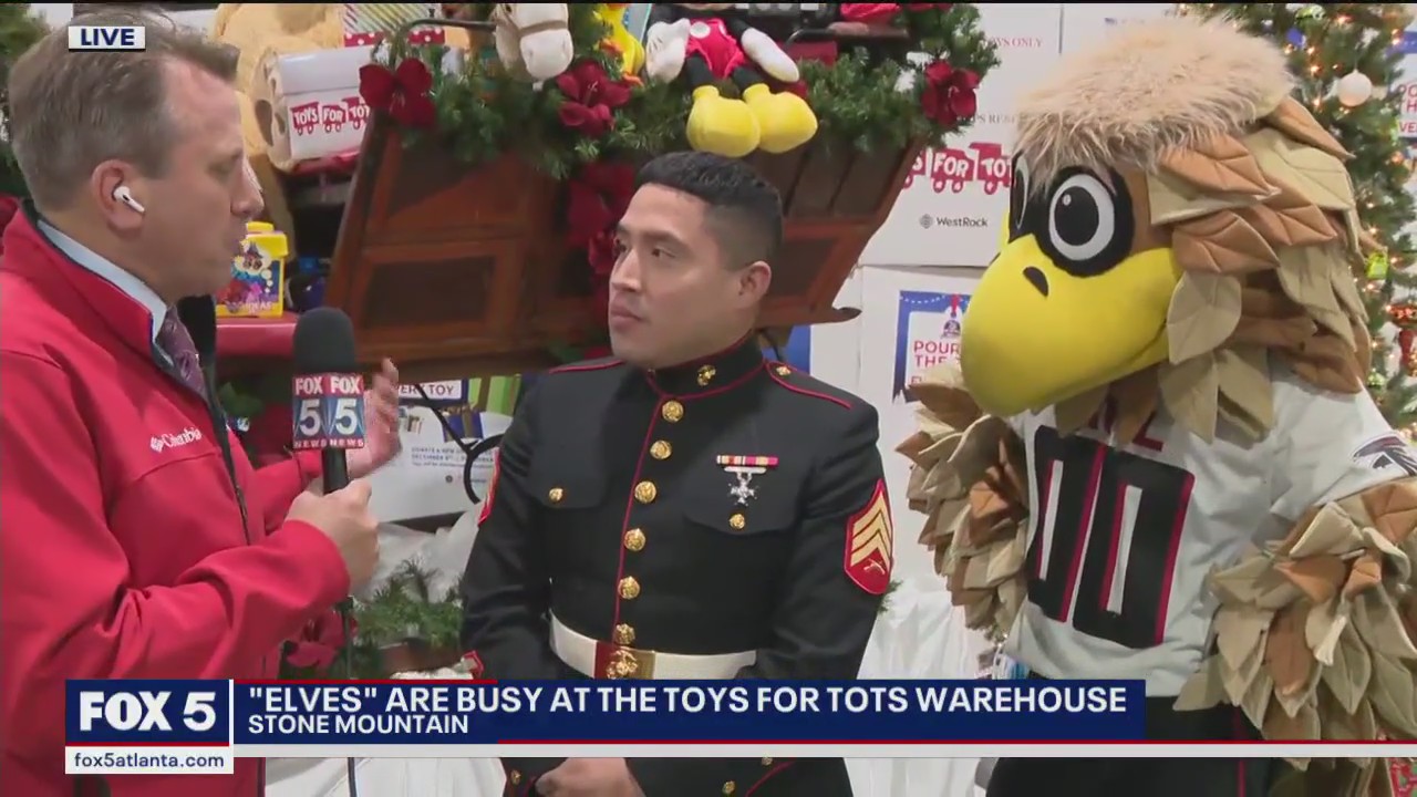 'Elves' busy at Toys For Tots Warehouse