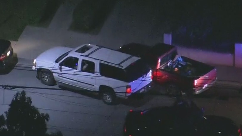 LA Police Chase: Suspect taunts authorities before SUV crashes into parked pickup truck