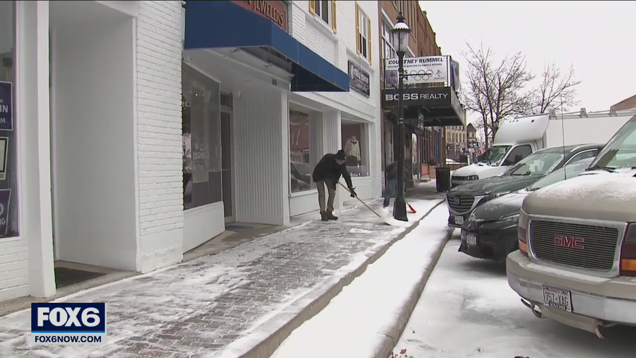 Shoveling ice and snow in West Bend