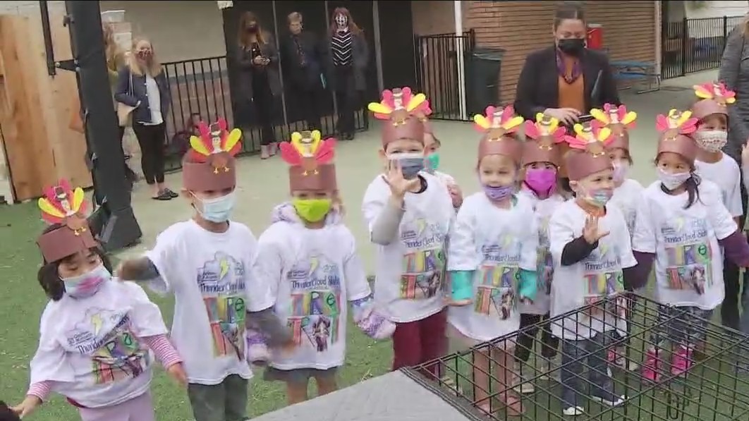 Kids participate in 'turkey call' for the ThunderCloud Subs Turkey Trot