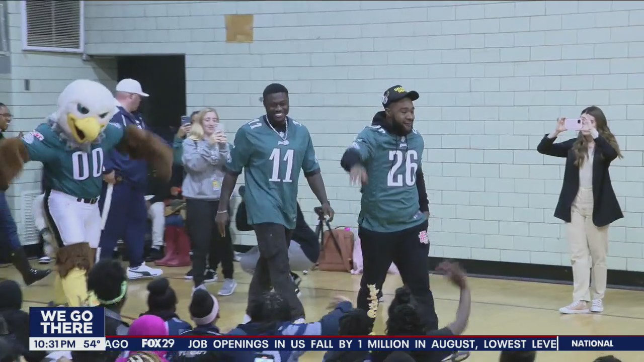 Eagles star players visit West Philadelphia Panthers youth football players and cheerleaders