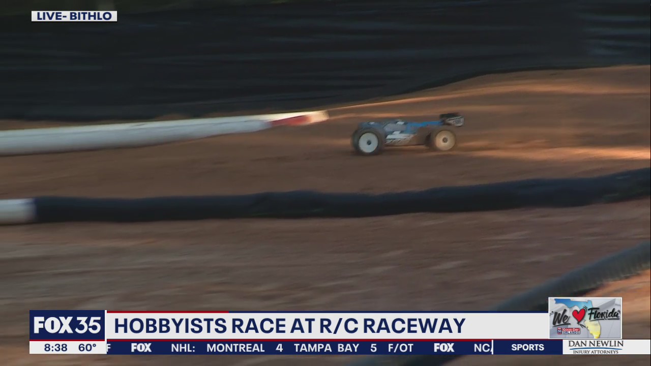Hobbyists race remote control cars at R/C Raceway in Orange County