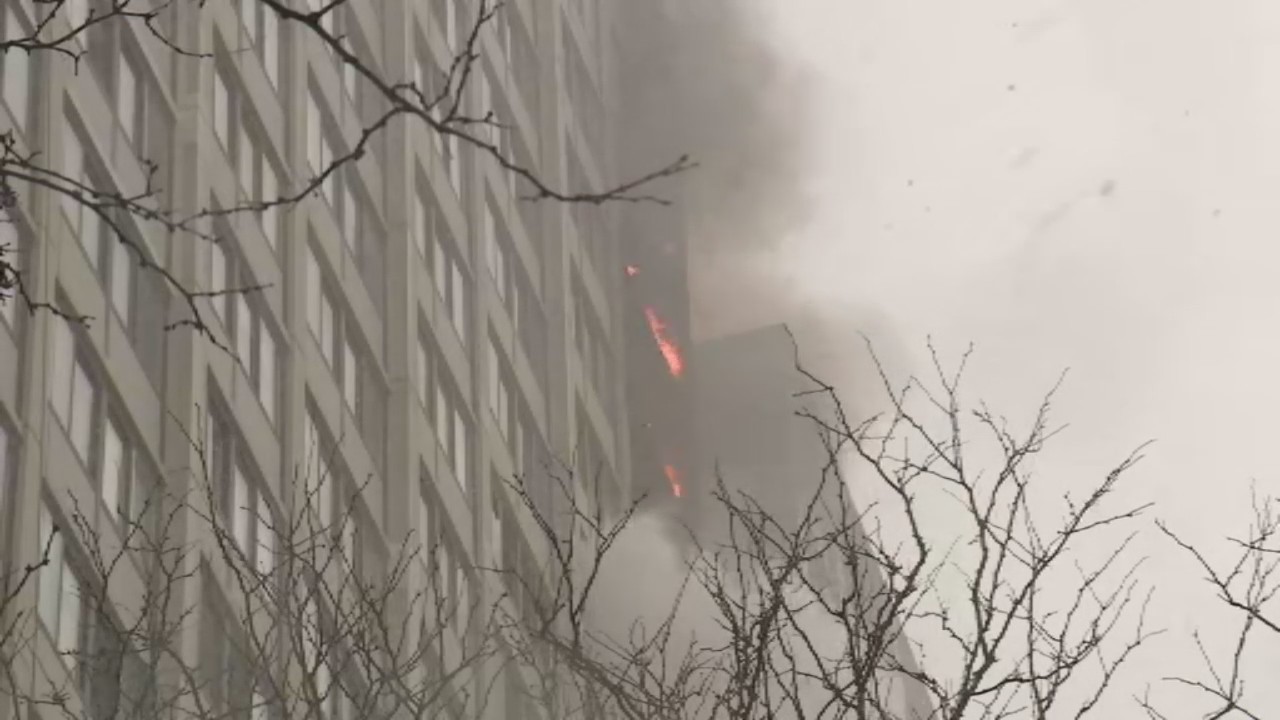 Extra-alarm fire breaks out on upper floors of high-rise in Kenwood