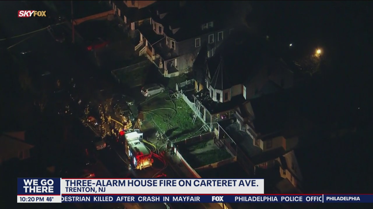 Three-alarm fire rips through home in Trenton