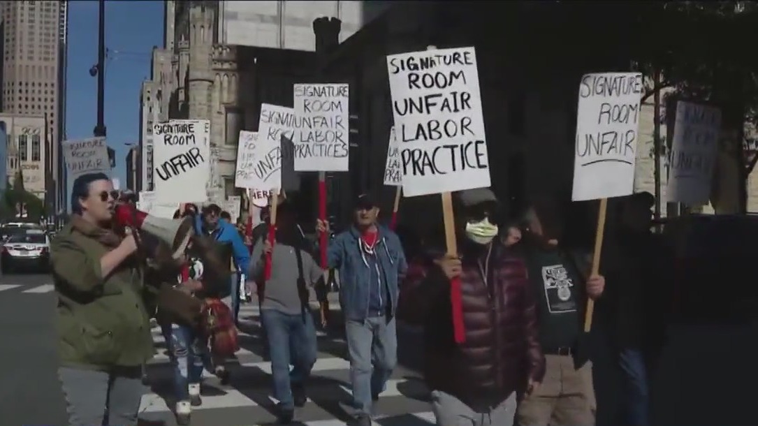 Former Signature Room workers protest sudden closure