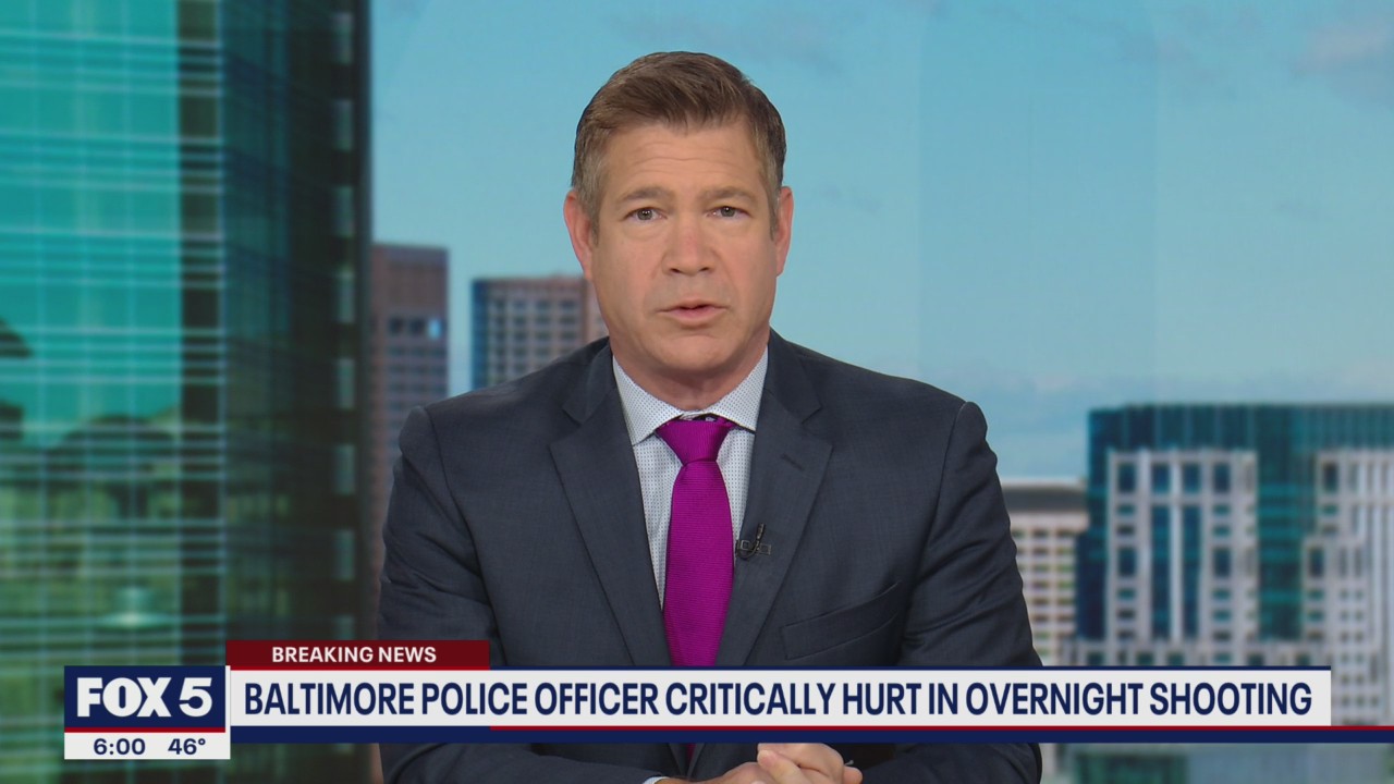 Baltimore police officer in critical condition after shot in ambush-style attack
