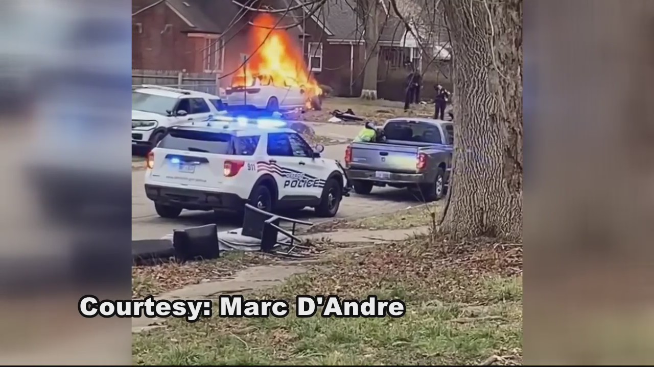 Detroit police officers rescue 3 from burning vehicle