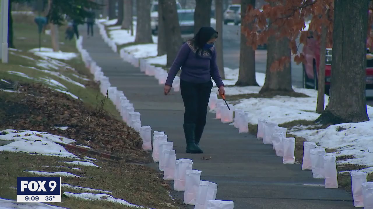 Thousands of luminaries light up Hopkins neighborhood on Christmas Eve