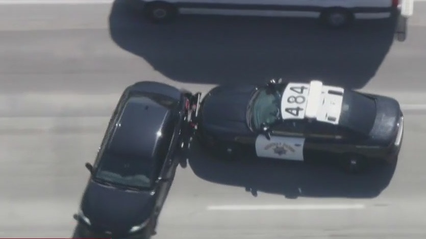 Police chase ends with PIT on freeway