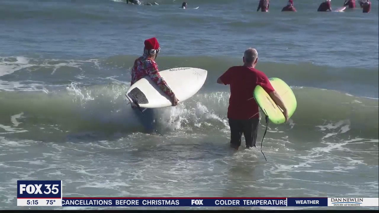 Surfing Santas returns to Cocoa Beach with large crowds