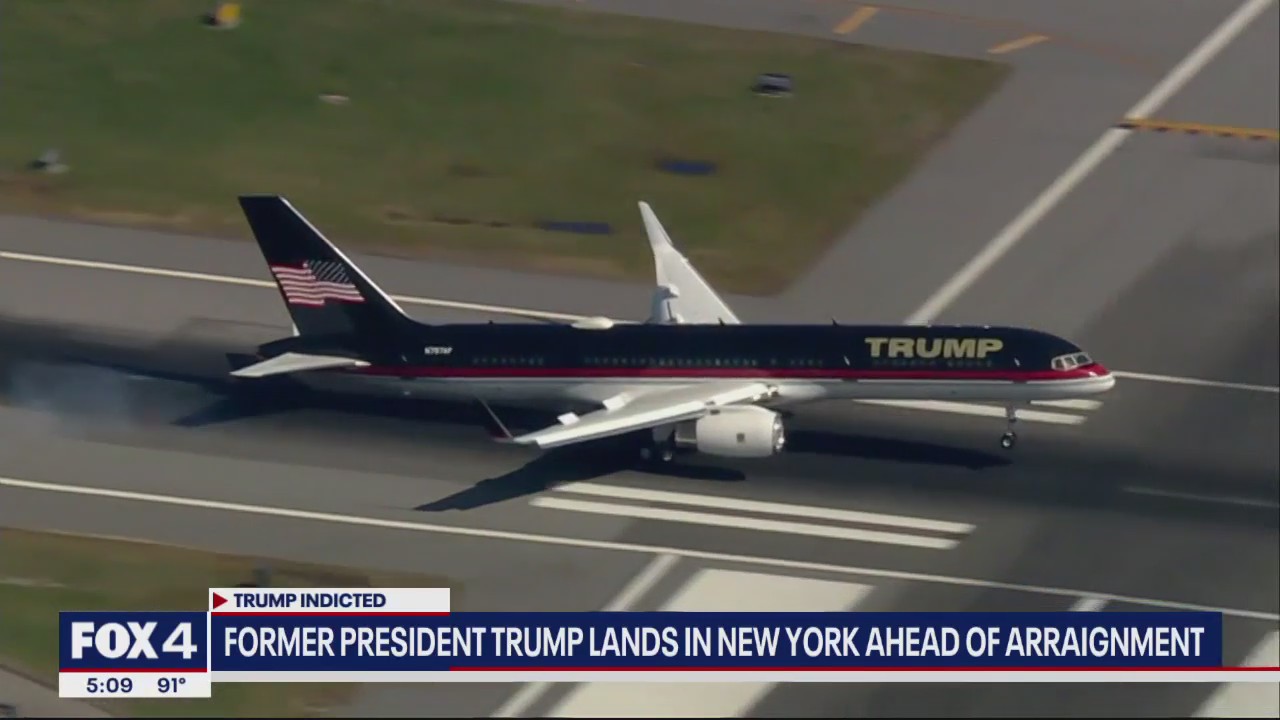 Former president Trump arrives in New York ahead of booking, arraignment