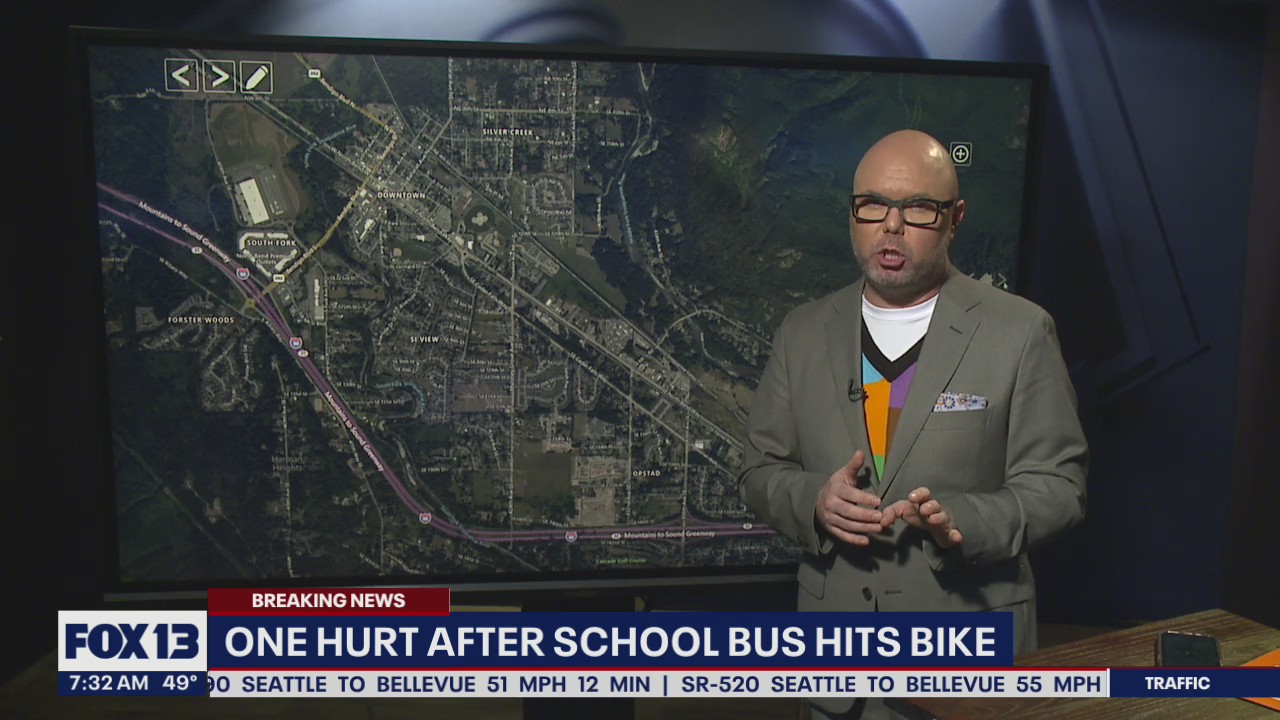 One hurt after school bus hits bike