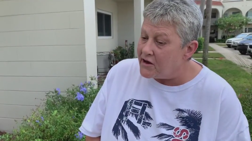 Neighbor says male nurse, accused of rape, once threatened her