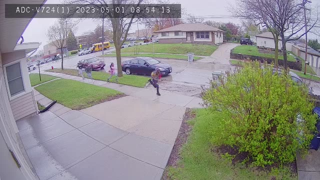 Car crashes into Milwaukee school bus; home surveillance video
