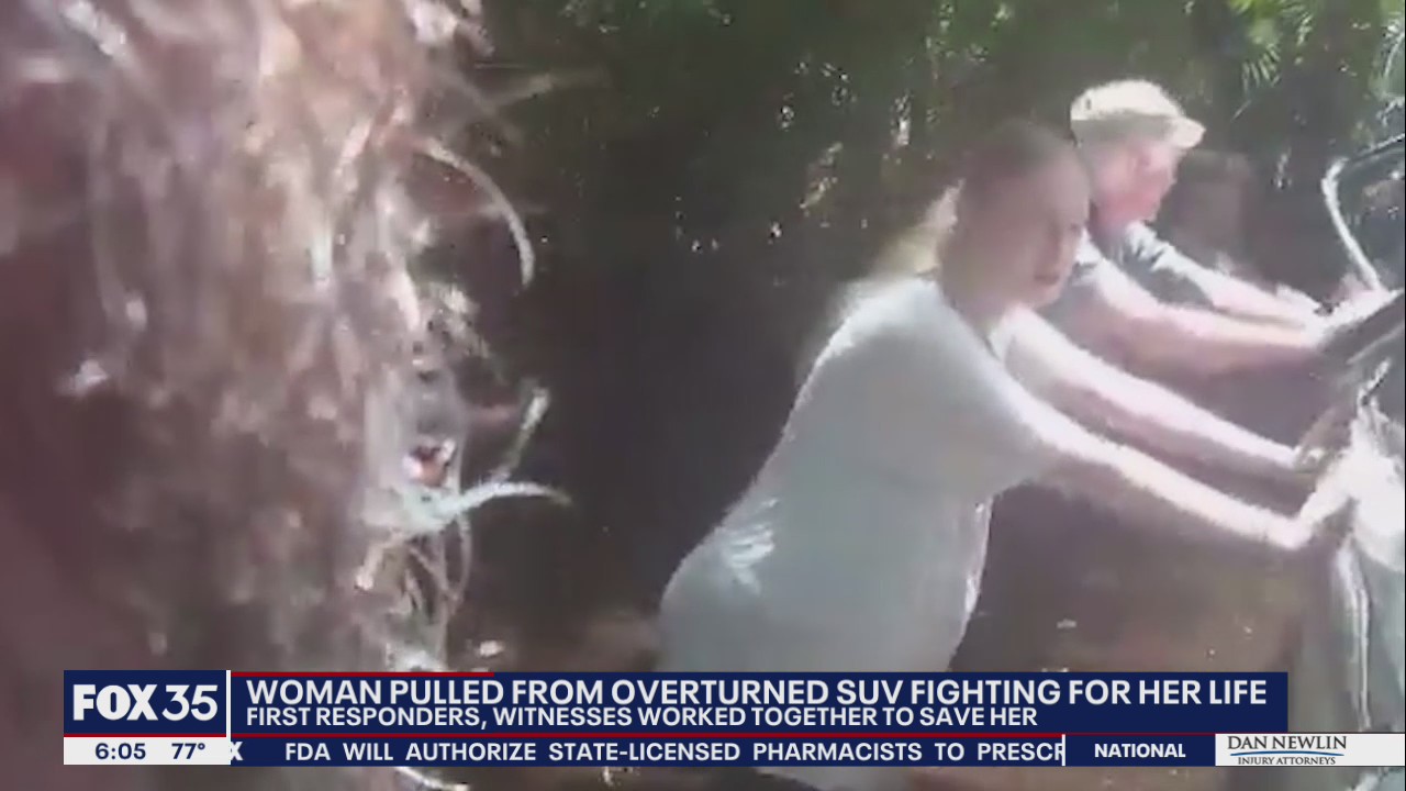 WATCH: First responders, witnesses help flip submerged SUV in Florida to rescue trapped woman