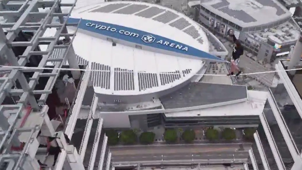 Daredevil on slack line over downtown LA