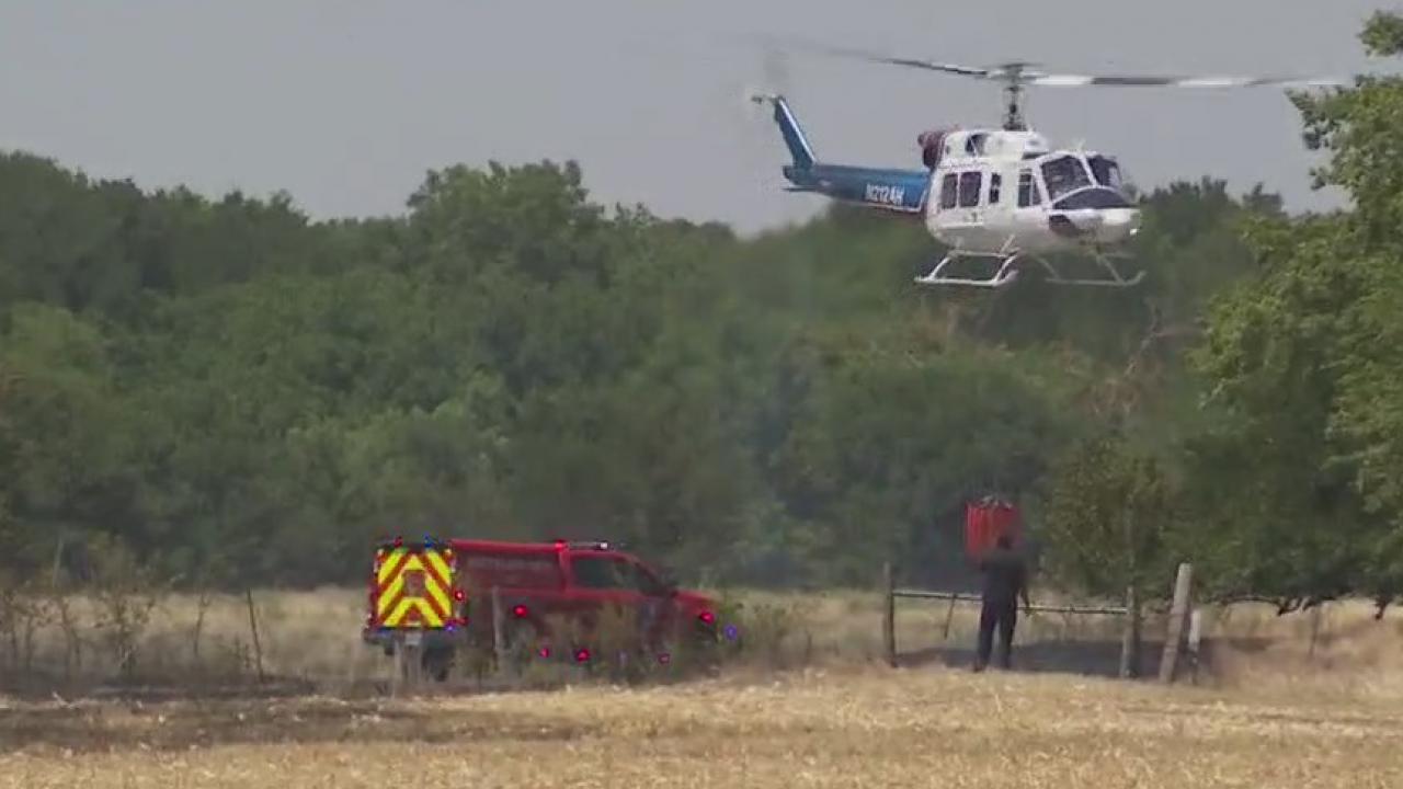 Multiple agencies work together to fully contain 60+ acre brush fire near Pflugerville