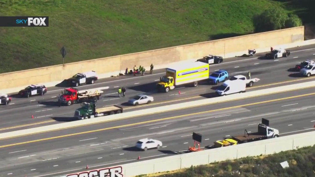 Driver killed by lumber off other truck