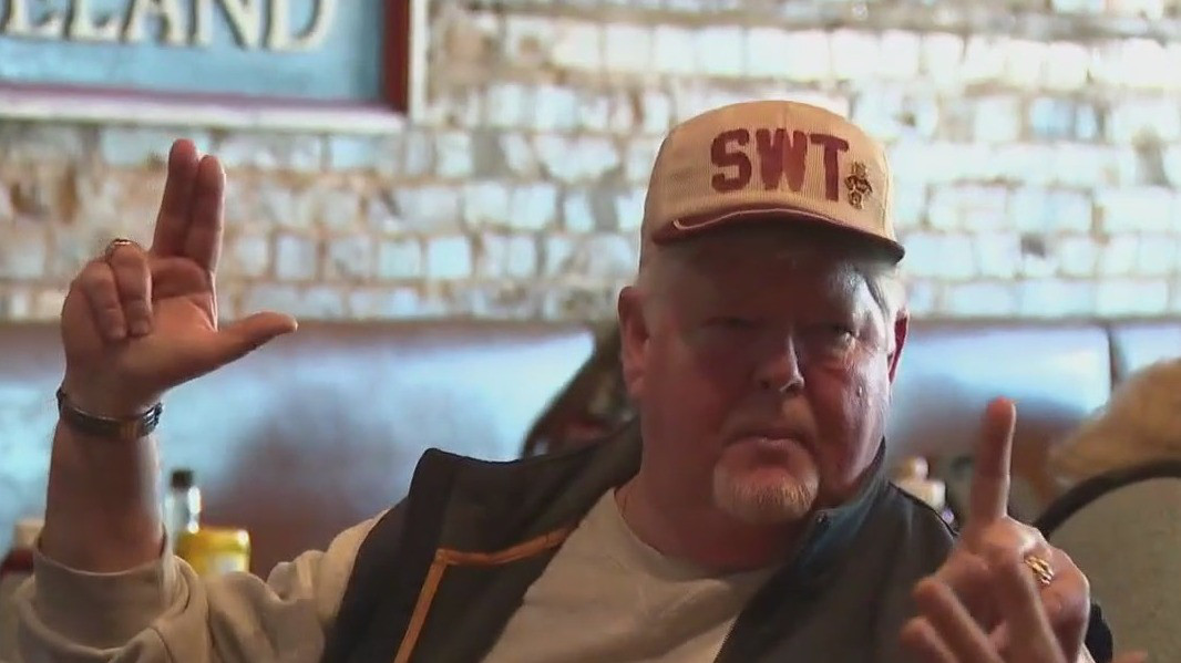 Texas State football fans watch bowl game