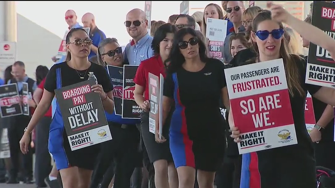 Southwest Airlines flight attendants picket outside of Dallas Love Field