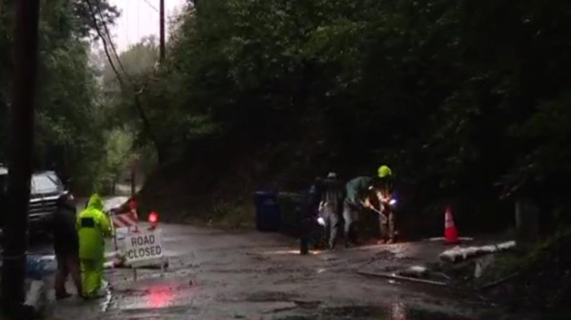 Neighbors in Santa Cruz work to save road so they aren't trapped
