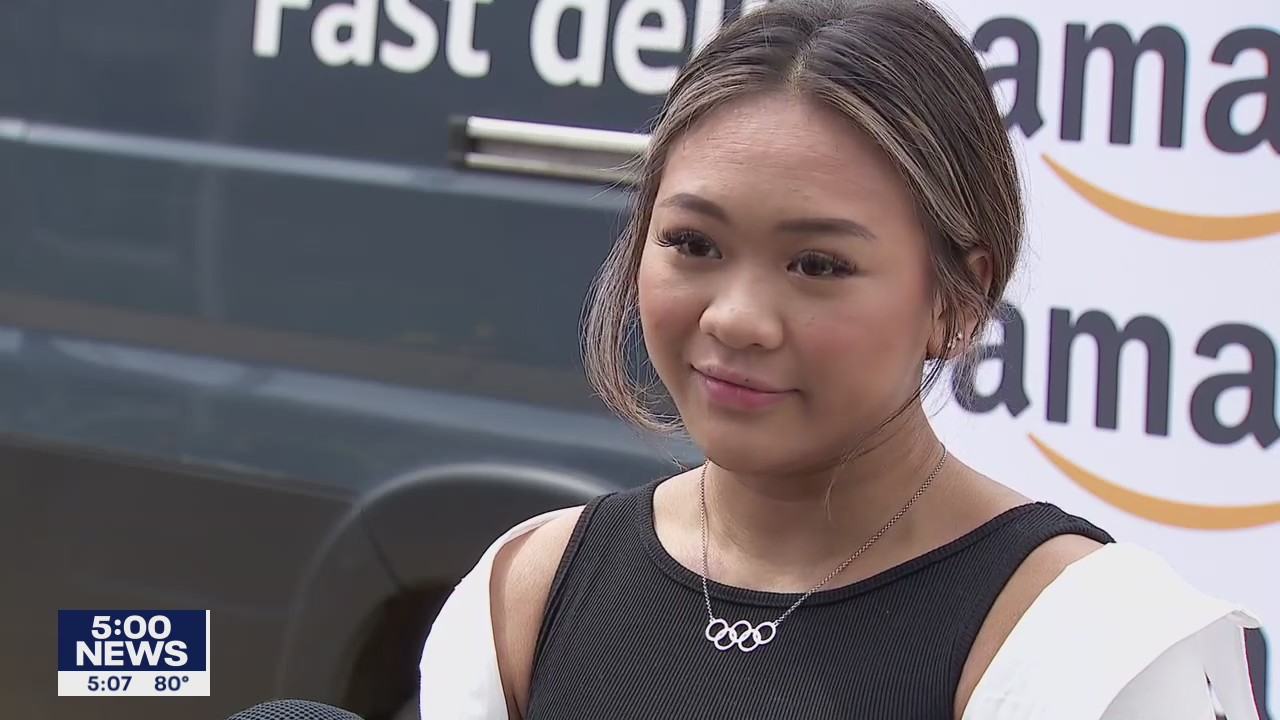 Olympic champion Suni Lee surprises students at St. Paul school