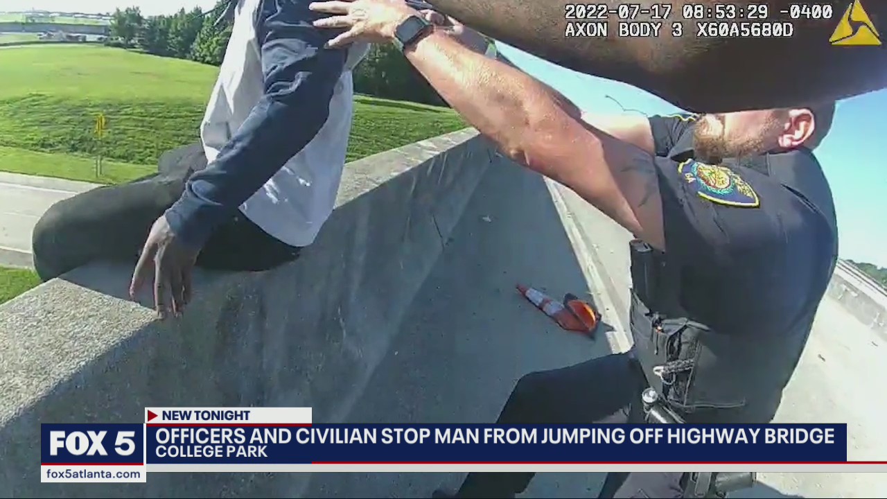 Officers, civilian help man in distress on I-85 overpass