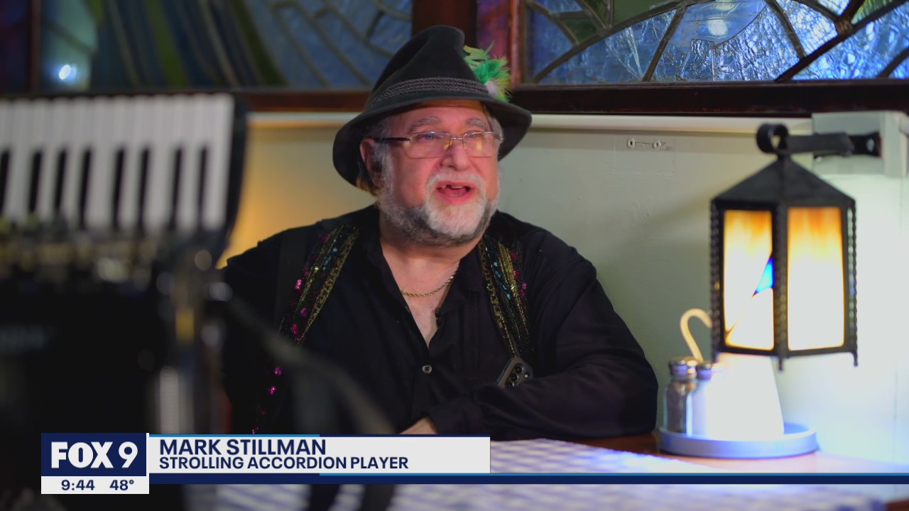 Strolling musician makes living playing accordion in Minneapolis