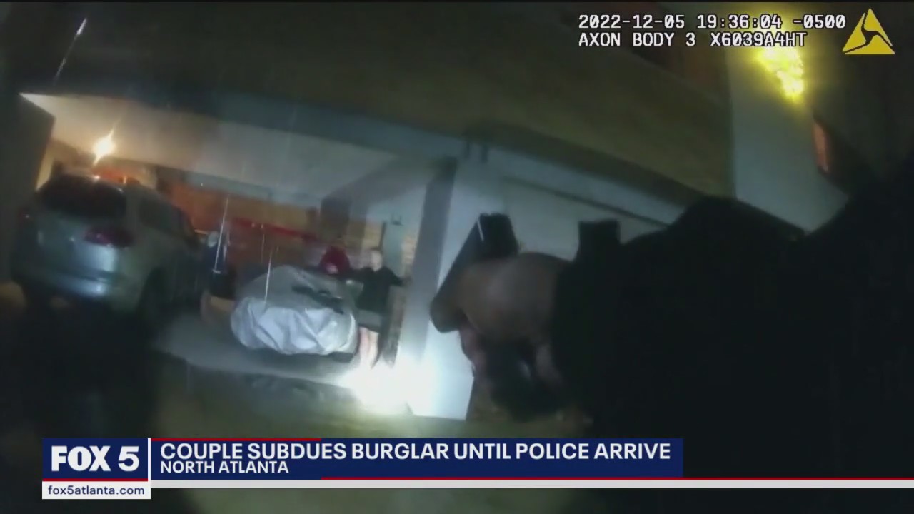 Couple subdues burglar until police arrive
