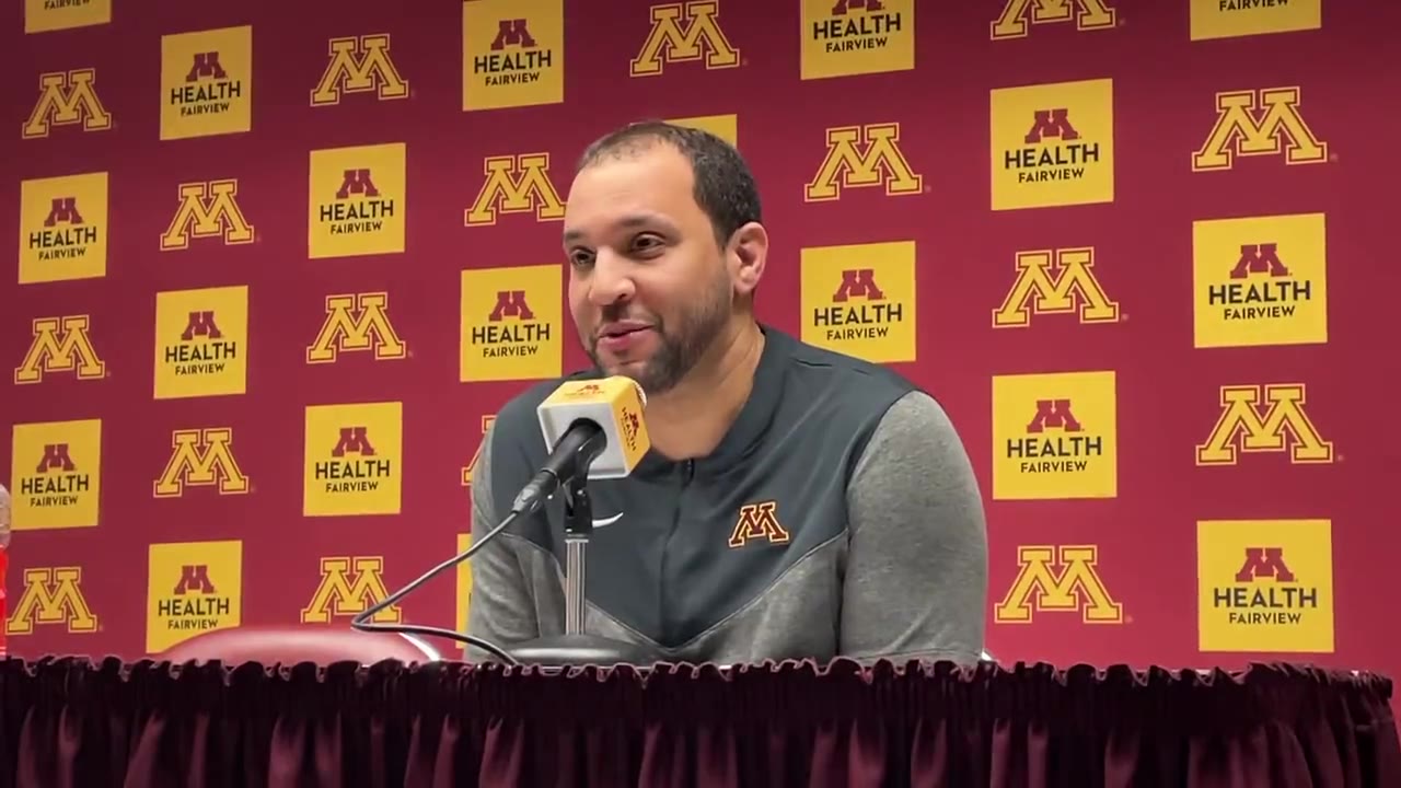 Ben Johnson reacts after Gophers beat Rutgers 75-74 to end 12-game skid